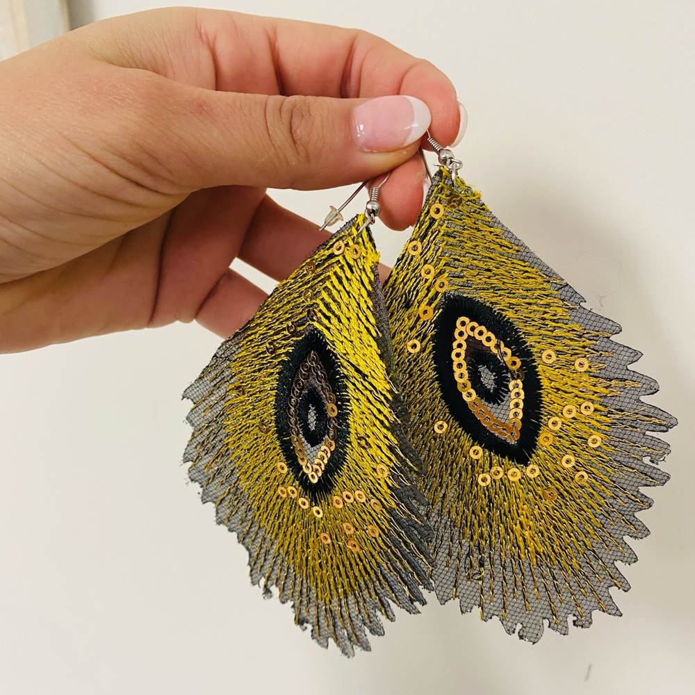 Yellow feather earrings